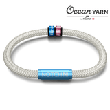 SUSTAINABLE OCEANYARN NOTCH BRACELET PLUS TWO NOTCH CHARMS