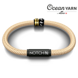 SUSTAINABLE OCEANYARN NOTCH BRACELET PLUS TWO NOTCH CHARMS