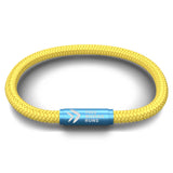 This Woman Runs Solid Yellow Cord NOTCH Bracelet with Blue Clasp