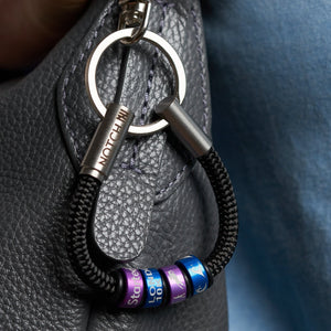 Sustainable OceanYarn Geocaching NOTCH Loop - Natural with blue aluminium ends