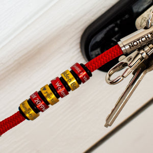 Red Cord Geocaching NOTCH Tale with red aluminium ends